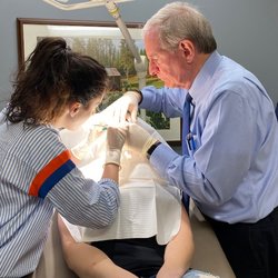 Mole being removed with an assist from Dr. Amanda Dilger. Roseville Facial Plastic Surgery
