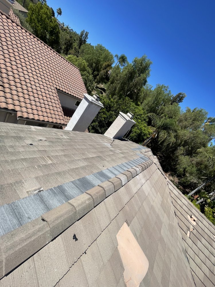 Slide of Drew The Roofer