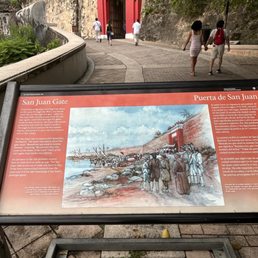 info.  part of gate in background.