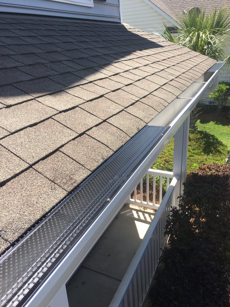 Slide of Saxon Roofing and Gutters