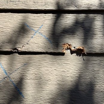 HomeGuard Incorporated - Siding damage by repair person on wall identified as damaged by inspector - Home Inspectors Near Me - Novato, California