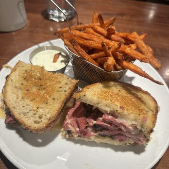 Friedman's - Pastrami Reuben with sweet potato fries - Breakfast & Brunch Near Me - New York, New York Friedman's - Pastrami Reuben with sweet potato fries - Breakfast & Brunch Near Me - New York, New York