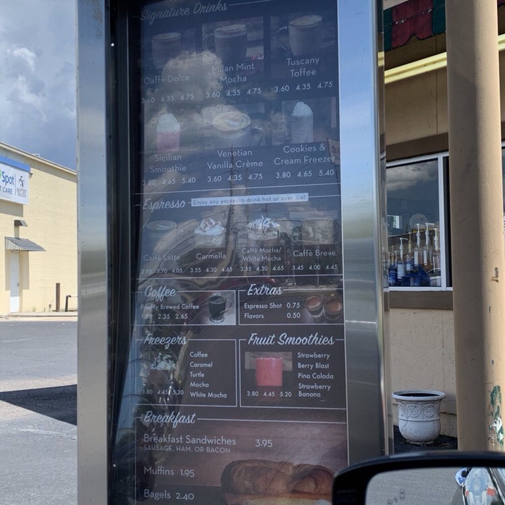 Ellianos Coffee Company - Couldn't get a good shot of the menu without glare - but they offer the good stuff! Don't worry about that! - Coffee & Tea Near Me - Jacksonville, Florida