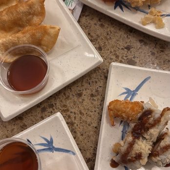 Sake Cafe - Deep Fried Pork Dumplings, chicken tempura and a shrimp tempura roll - Sushi Bars Near Me - Pensacola, Florida Sake Cafe - Deep Fried Pork Dumplings, chicken tempura and a shrimp tempura roll - Sushi Bars Near Me - Pensacola, Florida