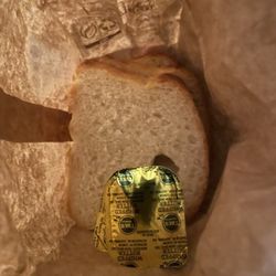 Angela's Italian Restaurant - Stale bread. It came with butter.