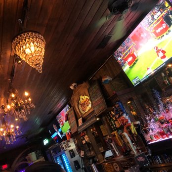 Inwood Tavern - a bar with a chandelier hanging from the ceiling - Dive Bars Near Me - Dallas, Texas Inwood Tavern - a bar with a chandelier hanging from the ceiling - Dive Bars Near Me - Dallas, Texas