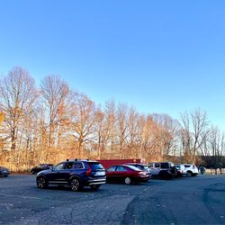 West Hartford Dog Park - Parking for the dog park located behind former st brigid's school, drive around the school and it's there
