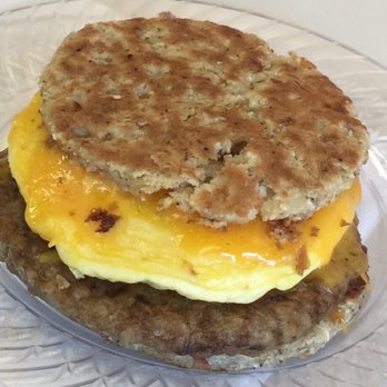 Coffee Guy Cafe - The exceptionally delicious cauliflower bun sausage egg cheese sandwich, XO. - Coffee & Tea Near Me - Pensacola, Florida