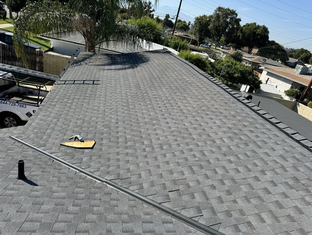 Slide of Elite Roofing and Solar Solutions