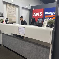Budget Car Rental - The face of the company yelling at me across the lobby.