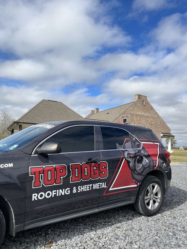 Slide of TopDogs Roofing&Sheetmetal