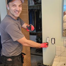 Roman is replacing a light switch. Roman is replacing a light switch.