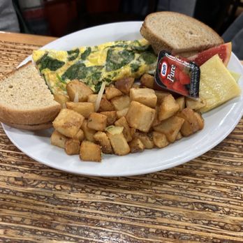 Dunn's Famous Deli - Spinach and goat cheese omelette with rye and hash browns - Delis Near Me - Ottawa, Ontario