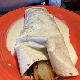 a burrito on a plate a burrito on a plate