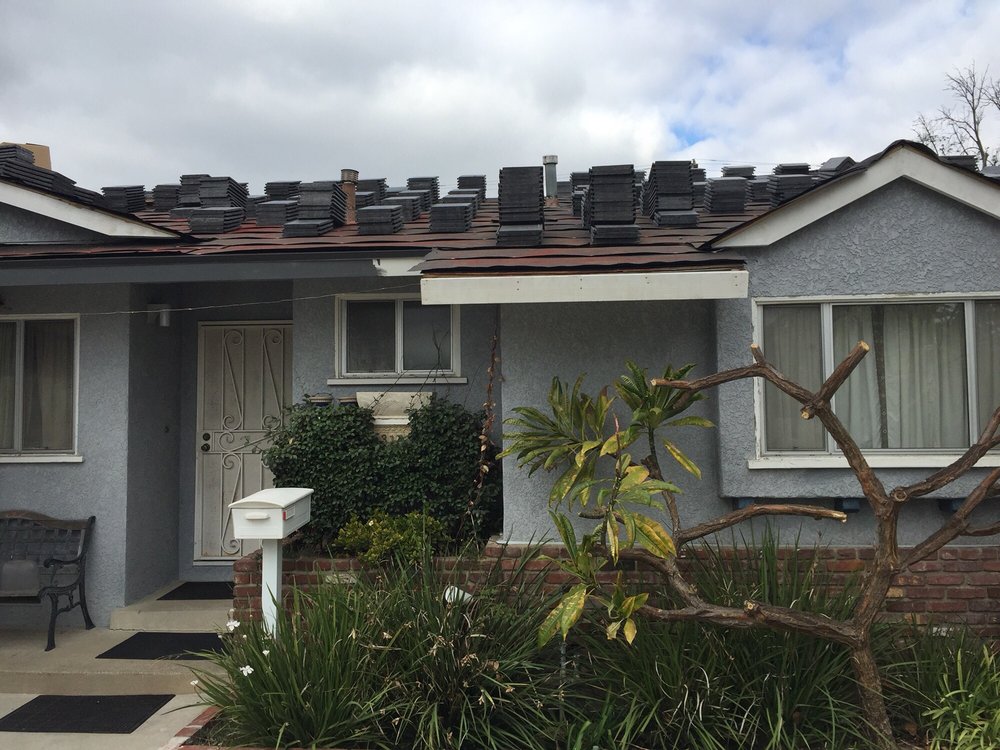 Slide of Mike's Reasonable Roofing