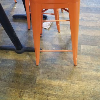 Tropical Smoothie Cafe - More trash and food under a table - there were several like this - Juice Bars & Smoothies Near Me - Biddeford, Maine