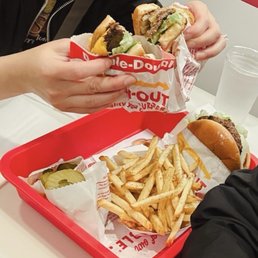 Regular burger and cheeseburger with whole grilled onion Regular burger and cheeseburger with whole grilled onion