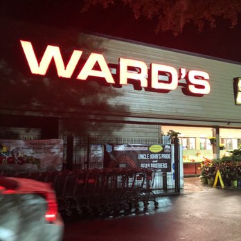 Ward's Supermarket - The welcoming entrance with lots of plants to peruse. - Grocery Near Me - Gainesville, Florida