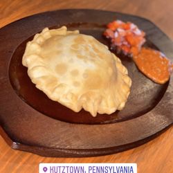 Petra’s Empanadas - Veggie, cheesy empanada with home made yummy salsa!