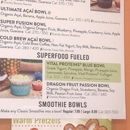 Menu featuring acai bowls, superfood bowls, and smoothies, with ingredients, calorie info, and prices at Juice It Up! in Albuquerque, NM.