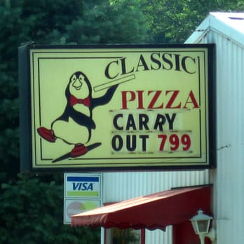 Classic Pizza - a sign for classic pizza carry out 799 - Pizza Near Me - Dexter, Michigan