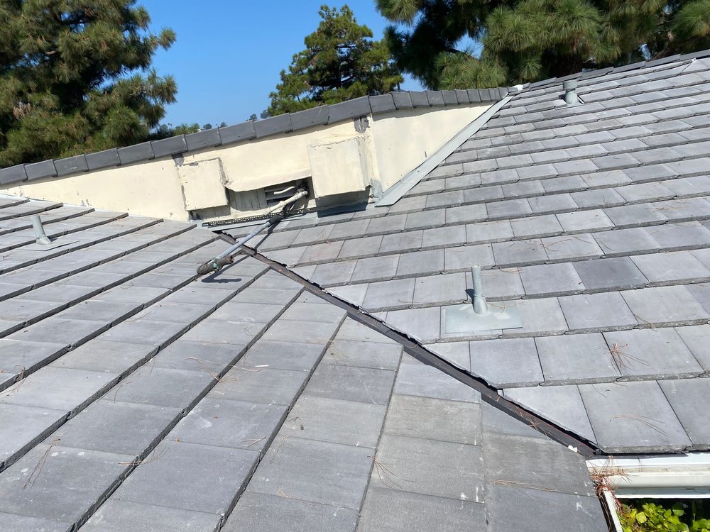 Slide of United Frontier Roofing