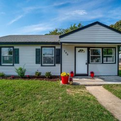 Wallace Construction - Whole home renovation. New siding, shutters, roof, windows, as well as an updated kitchen and bath.
