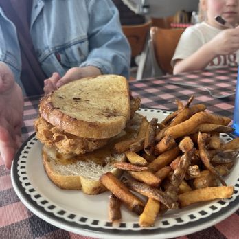 Hot honey fried chicken grilled cheese with hand cut, fresh tallow fries