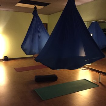 U Power Yoga - Savasana (resting pose) in aerial hammock. - Yoga Near Me - Edmond, Oklahoma