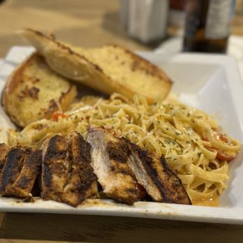 Distill - A Local Bar - Grilled Cajun Chicken Alfredo - Bars Near Me - Las Vegas, Nevada Distill - A Local Bar - Grilled Cajun Chicken Alfredo - Bars Near Me - Las Vegas, Nevada