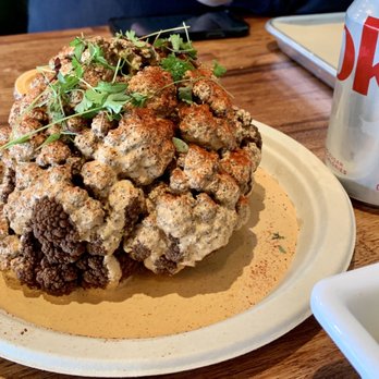 Mazra - Whole roasted cauliflower with tahini. So tender! - Middle Eastern Near Me - San Bruno, California Mazra - Whole roasted cauliflower with tahini. So tender! - Middle Eastern Near Me - San Bruno, California