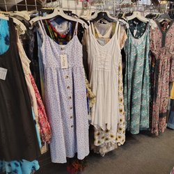 Waterbeds 'n' Stuff - Hippie dresses and boho clothing hanging on display