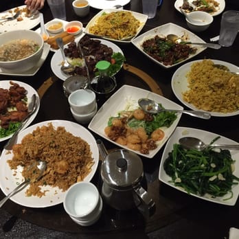 Nomad Asian Bistro - Our table... Mongolian Beef, Filet Mignon, Garlic Spinach, Honey Ginger Fried Chicken, singapore. Noodles, Curry fried rice ETC - Chinese Near Me - Long Beach, California
