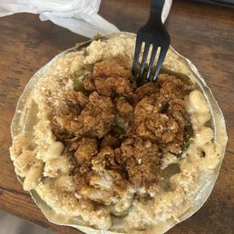 1lb serving of Mac N' Cheese with popcorn chicken, jalapeños, and panko bread crumbs as toppings 1lb serving of Mac N' Cheese with popcorn chicken, jalapeños, and panko bread crumbs as toppings