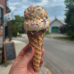 Freya’s - Summer is here! Rainbow sprinkles on a tasty scoop of gelato with a homemade gluten free waffle cone.