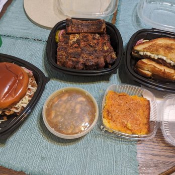 Big Rig’s BBQ - Got some to go! Pulled pork sandwich, ribs, brisket grilled cheese, cornbread, and beans - Barbeque Near Me - Monroeville, Pennsylvania