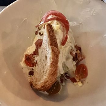 Elliott's Steakhouse - WEDGE $16 Bacon | Heirloom Tomato | Pickled Red Onion | Egg | Grilled Country Loaf | Blue Cheese Dressing - Steakhouses Near Me - Chandler, Arizona