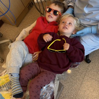 Kidz Dental Haven - Siblings Enjoying the Movie in the Chair - Pediatric Dentists Near Me - Seattle, Washington Kidz Dental Haven - Siblings Enjoying the Movie in the Chair - Pediatric Dentists Near Me - Seattle, Washington