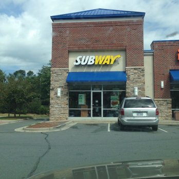 Subway - a car parked in front of a subway subway - Sandwiches Near Me - Winston-salem, North Carolina