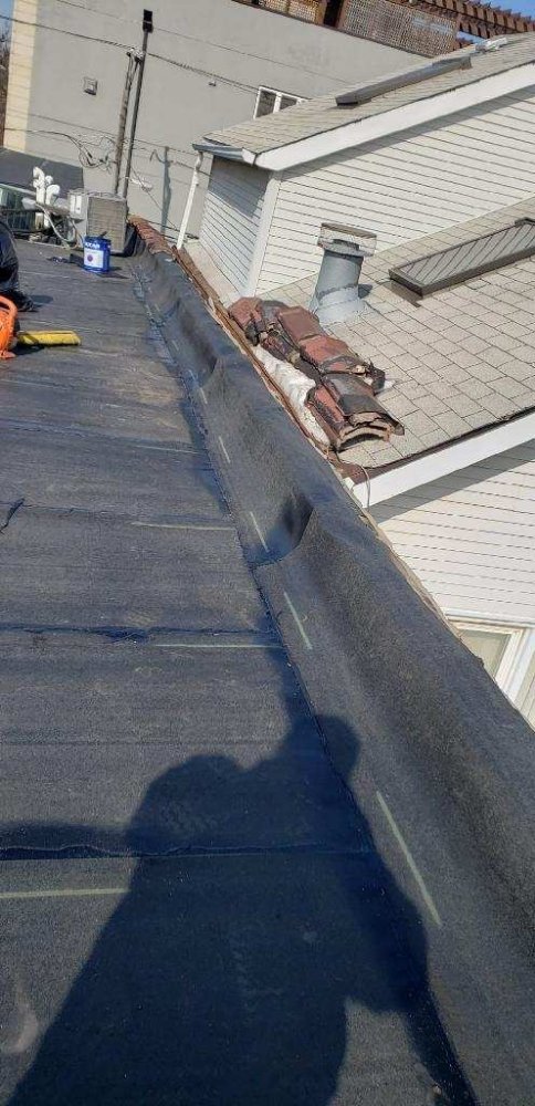 Slide of AAM Roofing & Masonry