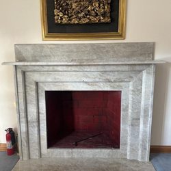 Onyx Marble & Granite - Taj Mahal Quartzite Fireplace
