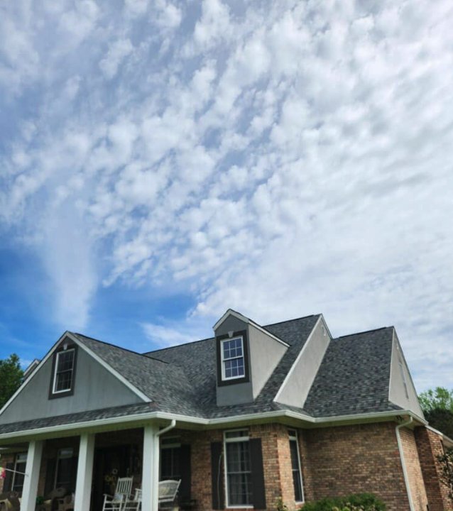 Slide of Backwoods Roofing
