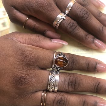 925 Silver Street - picture: purchased cross and plain band on my left ring finger and 3 layered ring with the spinning center on my right middle finger - Jewelry Near Me - Houston, Texas 925 Silver Street - picture: purchased cross and plain band on my left ring finger and 3 layered ring with the spinning center on my right middle finger - Jewelry Near Me - Houston, Texas