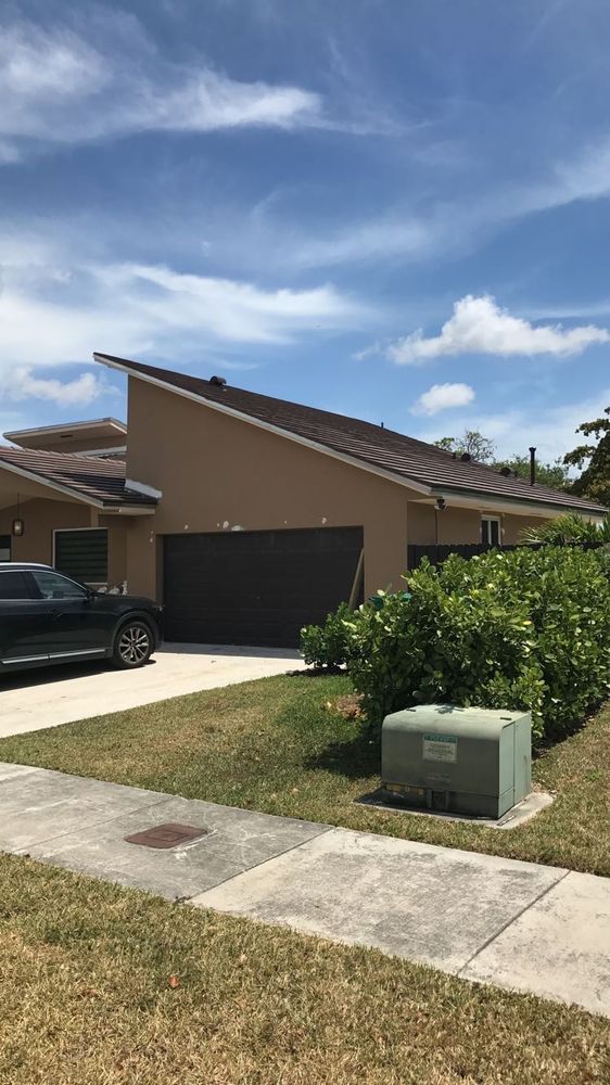 Slide of D-Tech Roofing