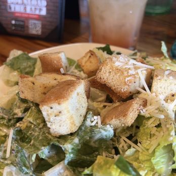 Bombshells Restaurant & Bar - Caesar salad and tequila sunrise (happy hour) $3 wells - New American Near Me - Arlington, Texas Bombshells Restaurant & Bar - Caesar salad and tequila sunrise (happy hour) $3 wells - New American Near Me - Arlington, Texas