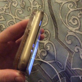 SquareTrade Go - I got my iPhone 6 screen fixed by Peter. Unfortunately when he fixed it, completely messed up my phone. The crack shown is in the liquid - Mobile Phone Repair Near Me