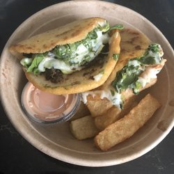 Papa’s Arepas - Classic chicken arepas and black bean pork avacado arepa