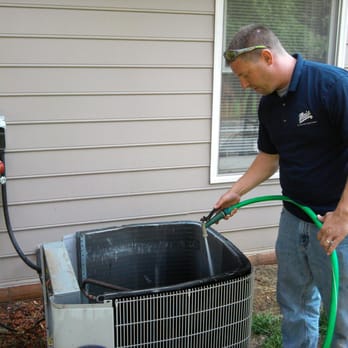 Main Heating & Air Conditioning - Here's Tom cleaning the coil of a customer's outdoor unit. One of the many items provided with a residential maintenance agr... - Heating & Air Conditioning/HVAC Near Me - Roanoke, Virginia Main Heating & Air Conditioning - Here's Tom cleaning the coil of a customer's outdoor unit. One of the many items provided with a residential maintenance agr... - Heating & Air Conditioning/HVAC Near Me - Roanoke, Virginia