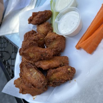Midtown Gastro Bar - 12-piece of Buffalo wings w/ranch and bleu cheese dressings - Burgers Near Me - Sacramento, California Midtown Gastro Bar - 12-piece of Buffalo wings w/ranch and bleu cheese dressings - Burgers Near Me - Sacramento, California
