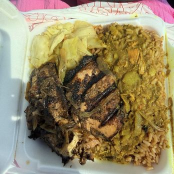 Spice It Up - Rice and pease with curry sauce on top, three tiny pieces of jerk chicken and a forkful of cabbage - Caribbean Near Me - Norcross, Georgia Spice It Up - Rice and pease with curry sauce on top, three tiny pieces of jerk chicken and a forkful of cabbage - Caribbean Near Me - Norcross, Georgia